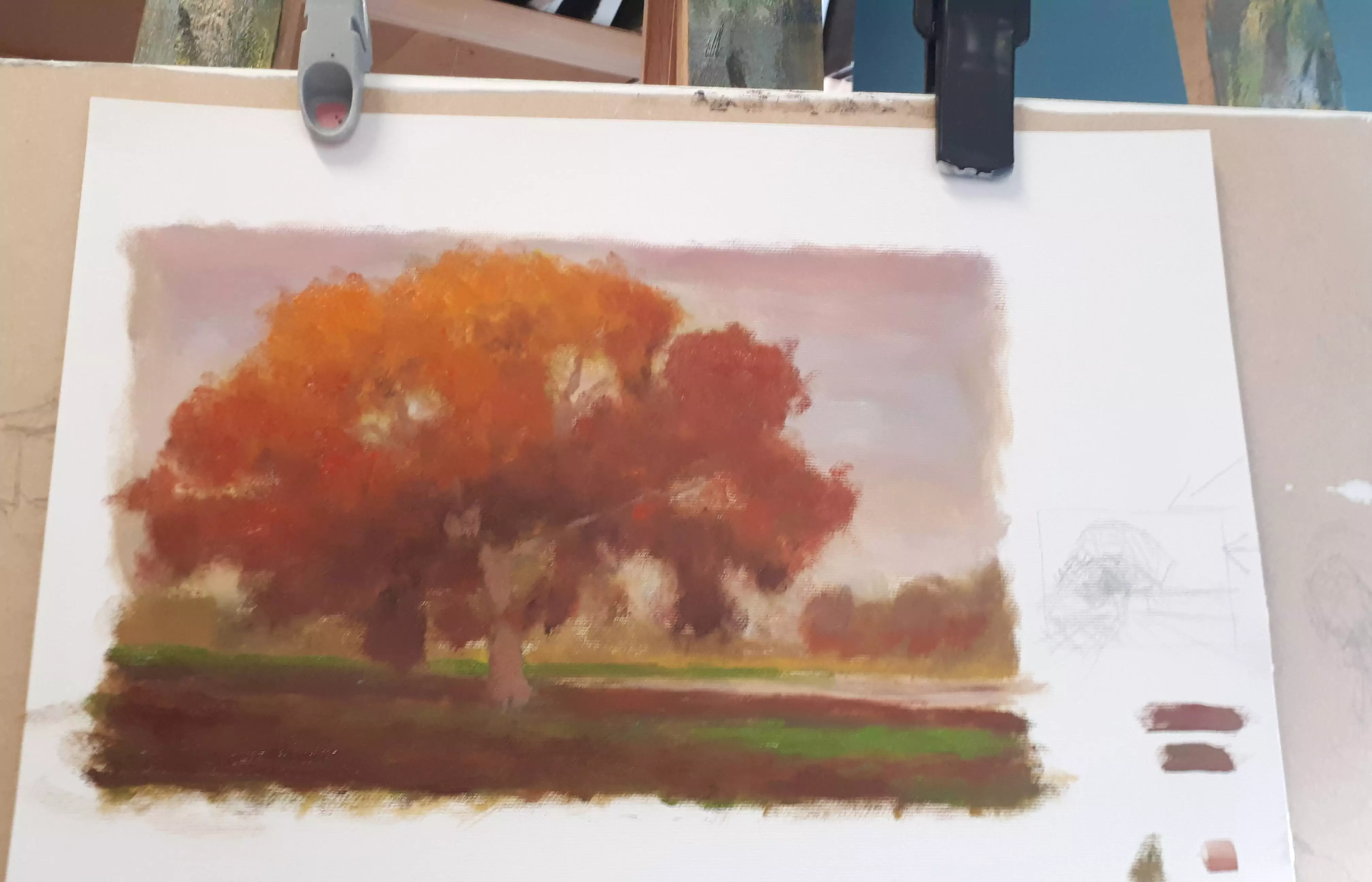 In this image we see a small 
oil sketch painted in preparation for the final work seen above. However the composition in this sketch ultimately was 
not the one I choose for the final version. In this sketch the tree is placed at the left and is much larger in the painting,
covering most of the sky and middle ground. Another difference is that in this composition the water runs behind the tree 
instead of in front of it. The colours though are almost entirely the same as what would be in the finished piece except 
here the land also features a bit of green for grass.